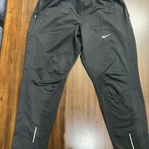 Nike Black and White Joggers with Tapered Leg and Reflective Details